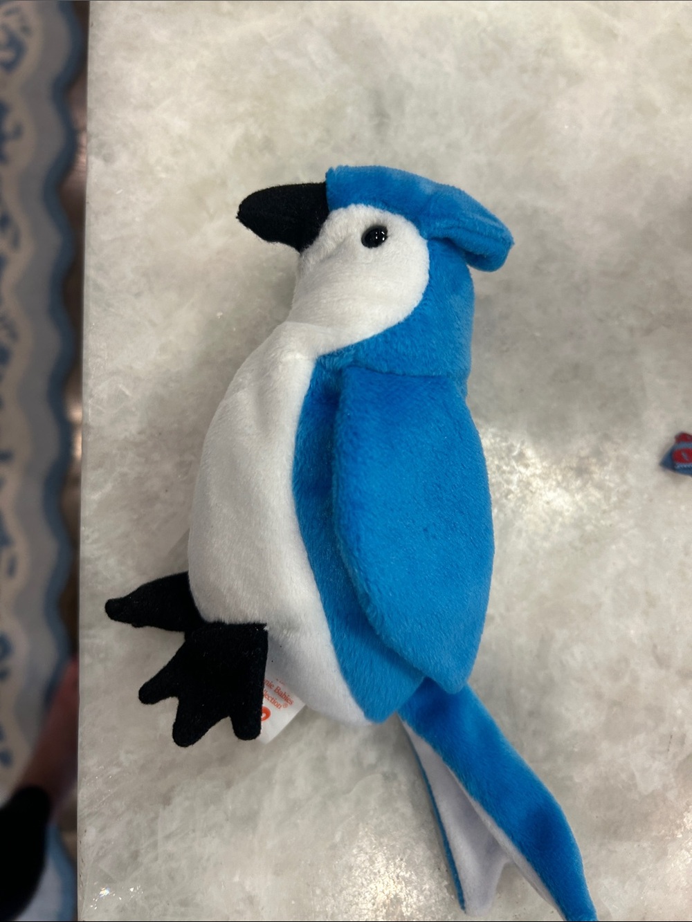 Blue and White Plush Parrot “rocket” beanie baby